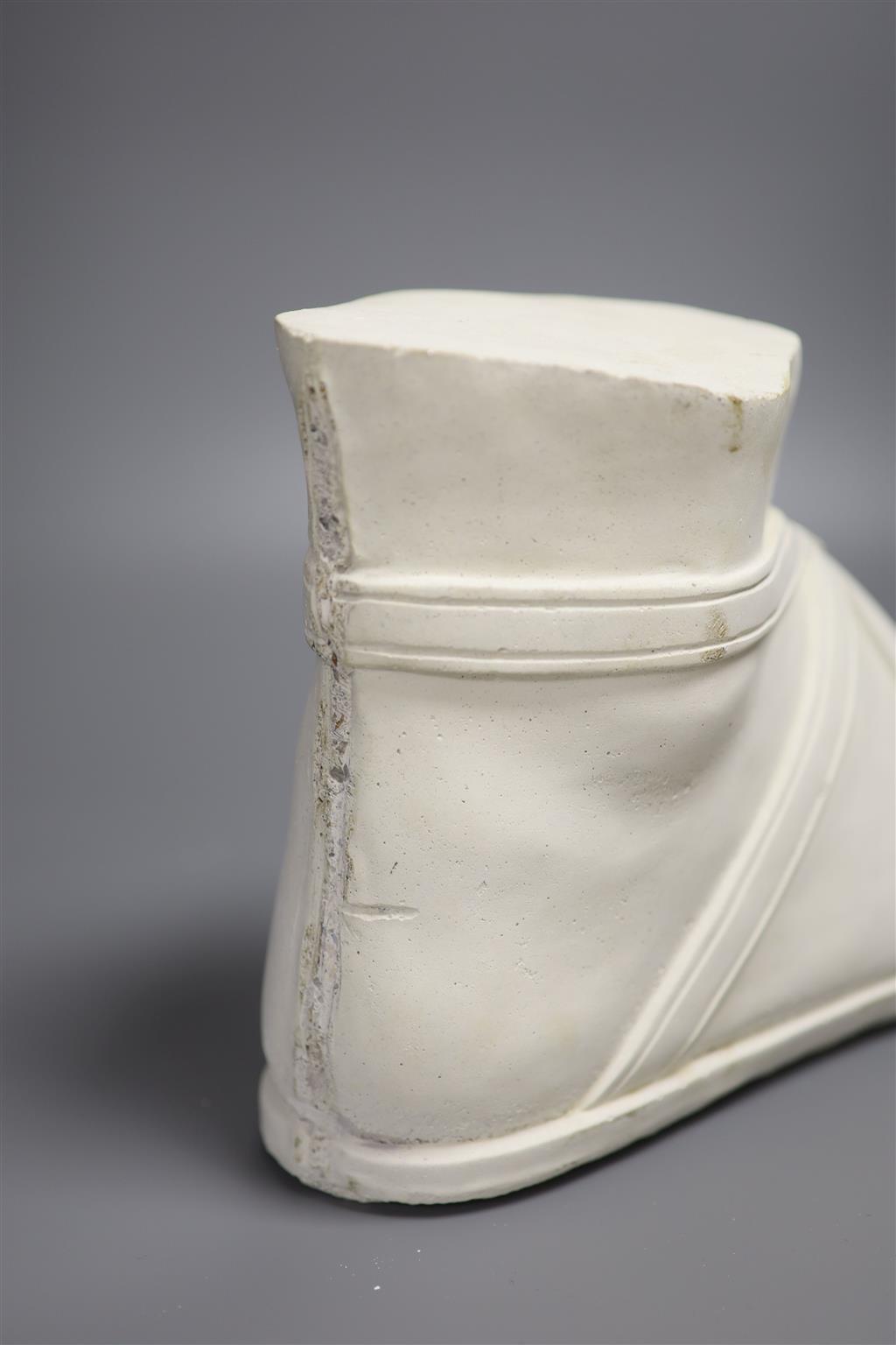 A cast plaster model of a gladiators foot, length 37cm